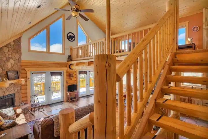 Elegant wooden staircase connects the living room to the lofted living space. Everyone can have their own space to hang out but still feel connected. 