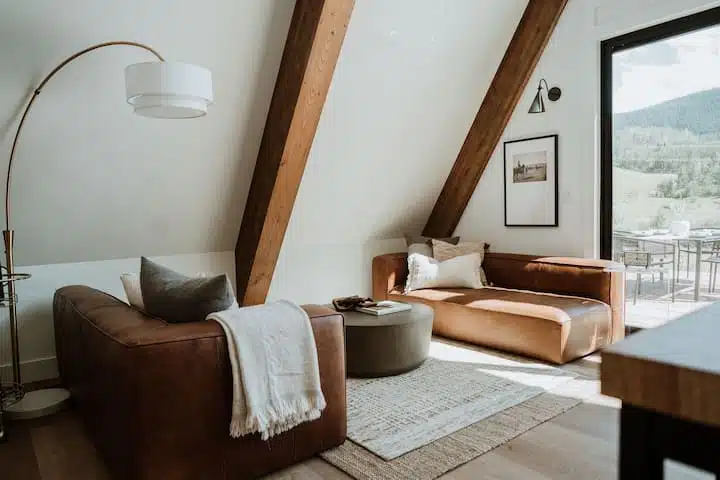 Relax and take in the glorious views. The A-frame backs to 6 acres of private land.