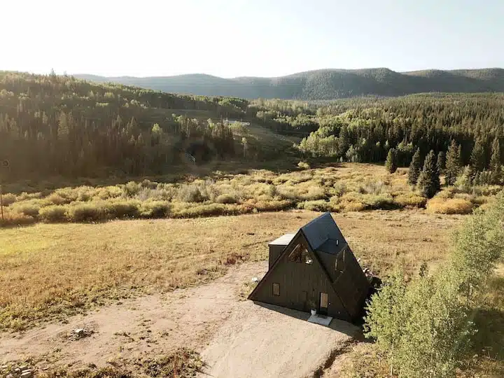 Enjoy the serenity of 6 acres bordering National Forest.
