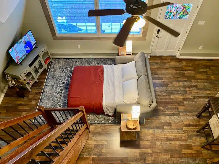 Cindy Crawford sleeper sofa in living room. Full size sleeper. Sheets and bedding including extra pillows are in downstairs bedroom closet. 